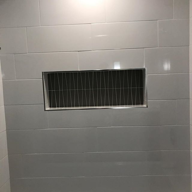 Just finishing up another nice tile shower